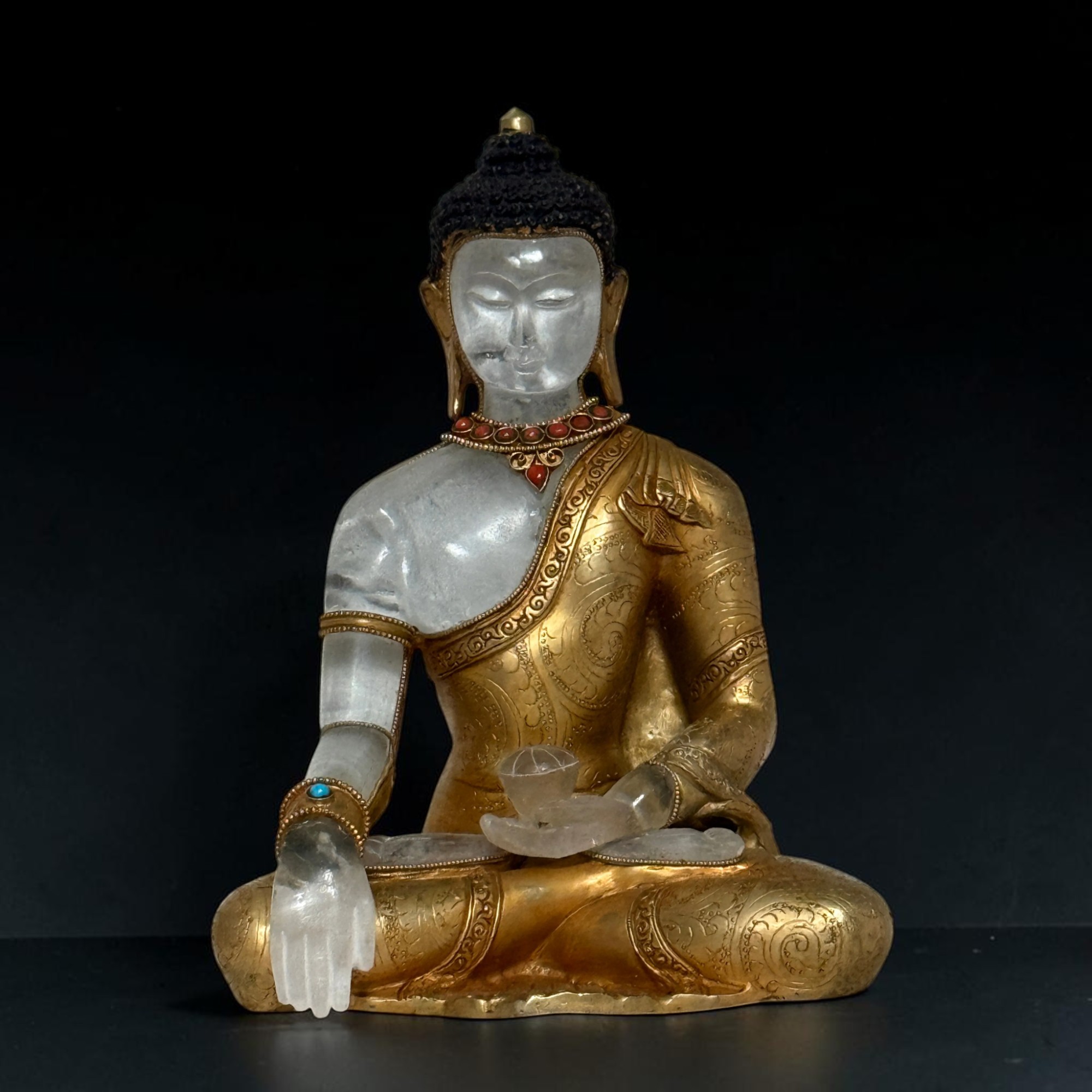 Bronze Buddha Figur feuervergoldet mit Bergkristall aus Nepal