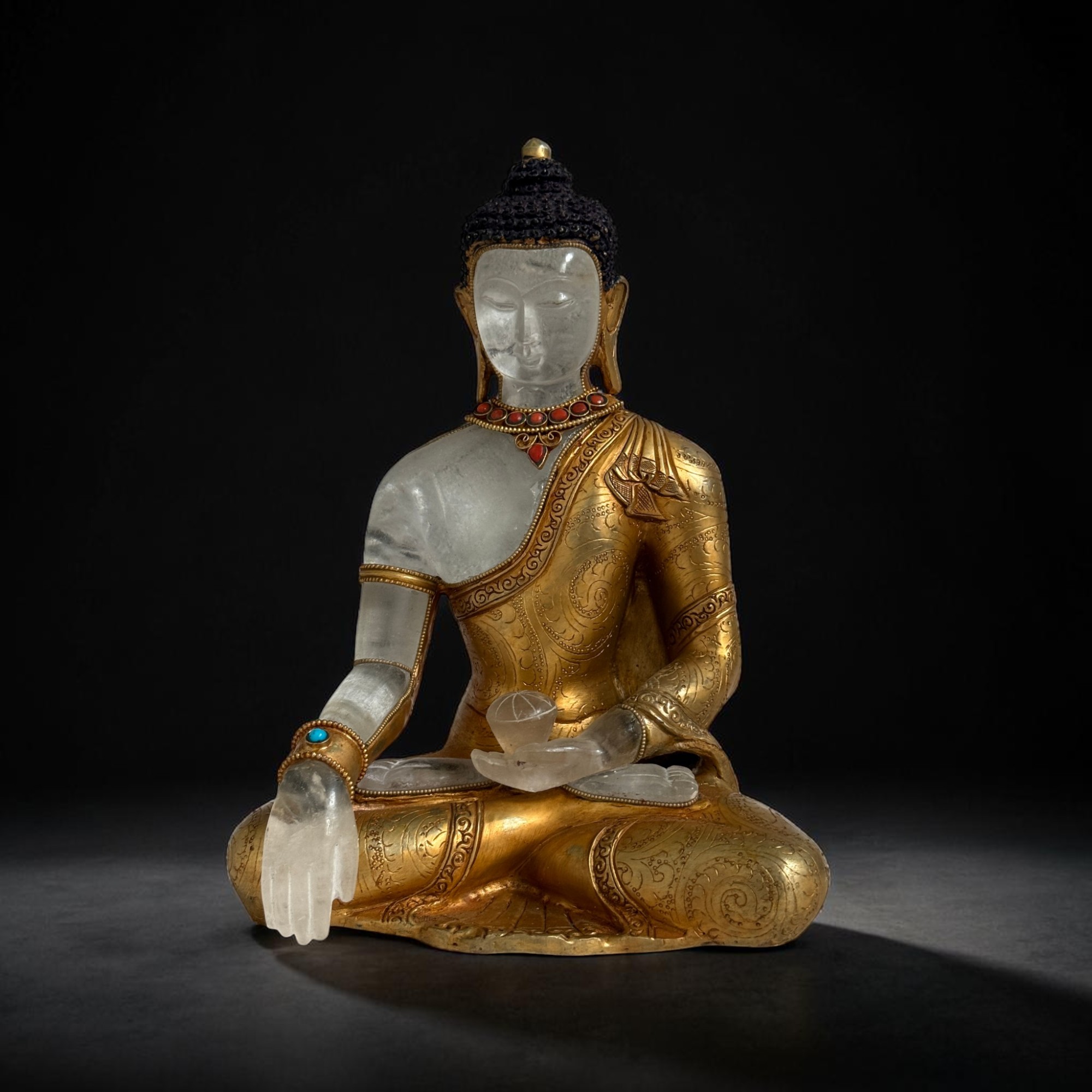 Bronze Buddha Figur feuervergoldet mit Bergkristall aus Nepal